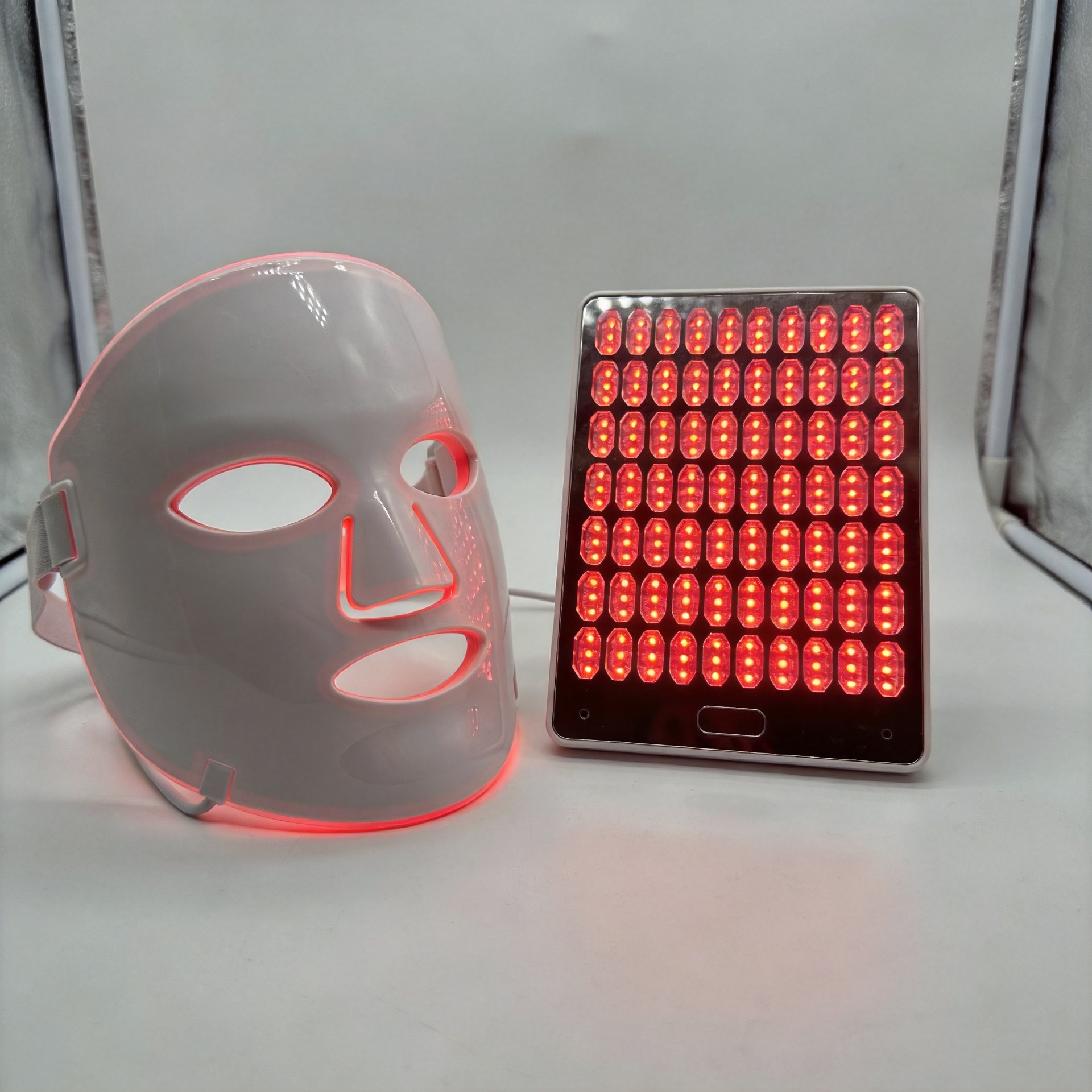 Red light therapy mask vs. panel which offers better portability.