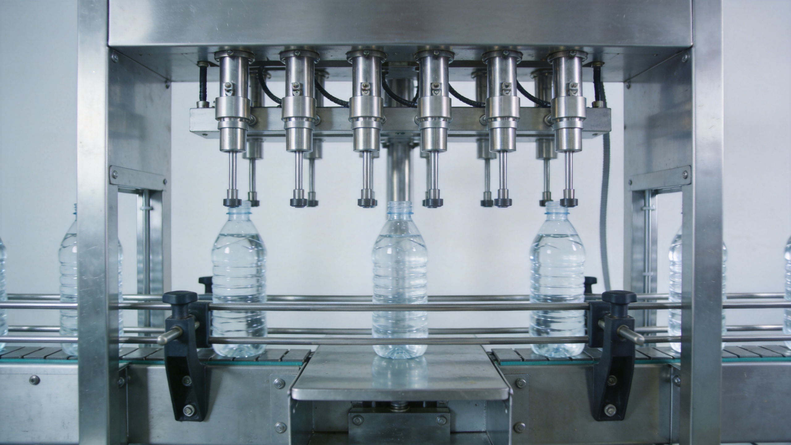 Compact water bottle filling workstation for a small-scale enterprise