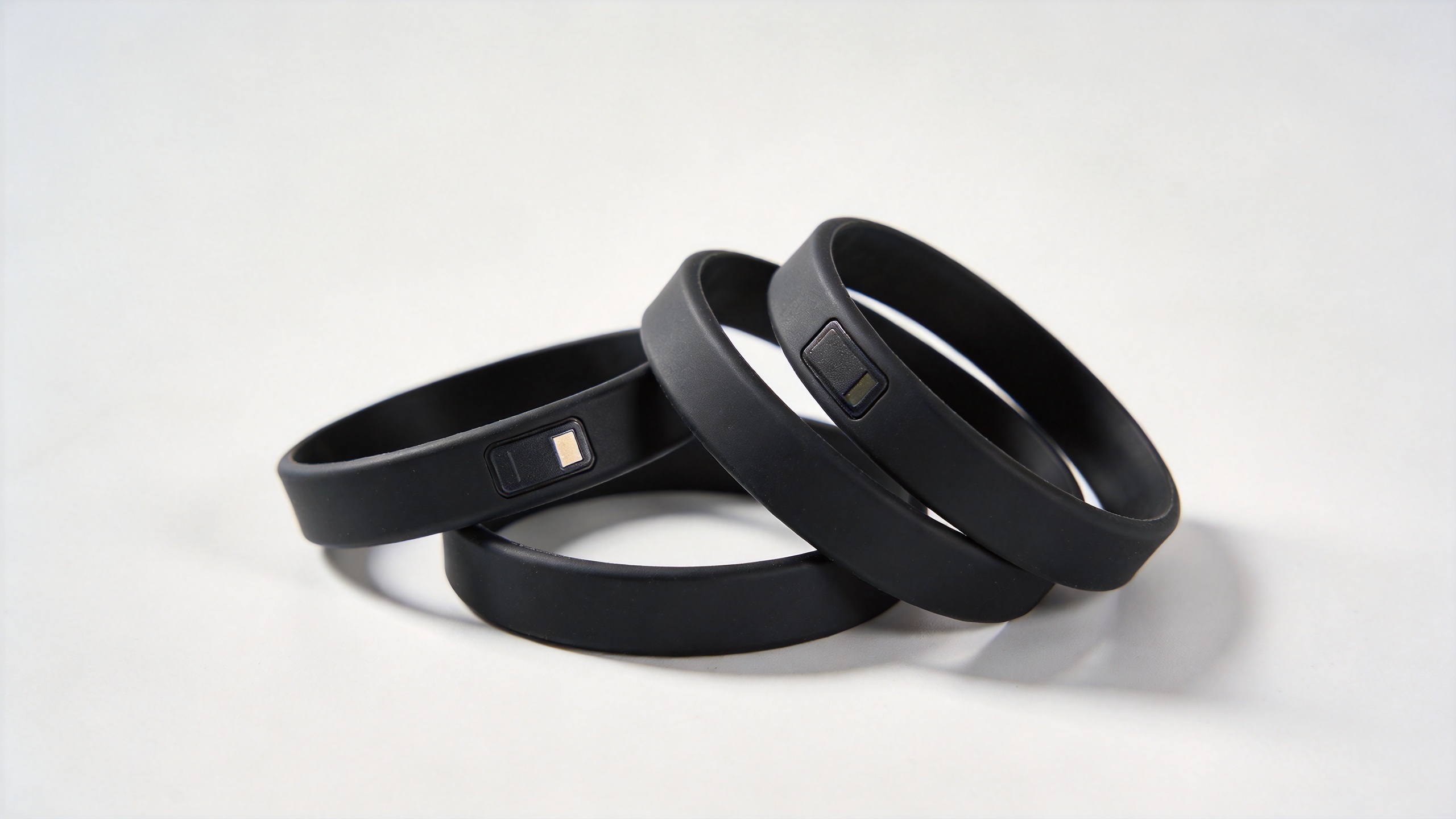 Blank NFC silicone bracelets with embedded NTAG213 chip inlay ready for event customization