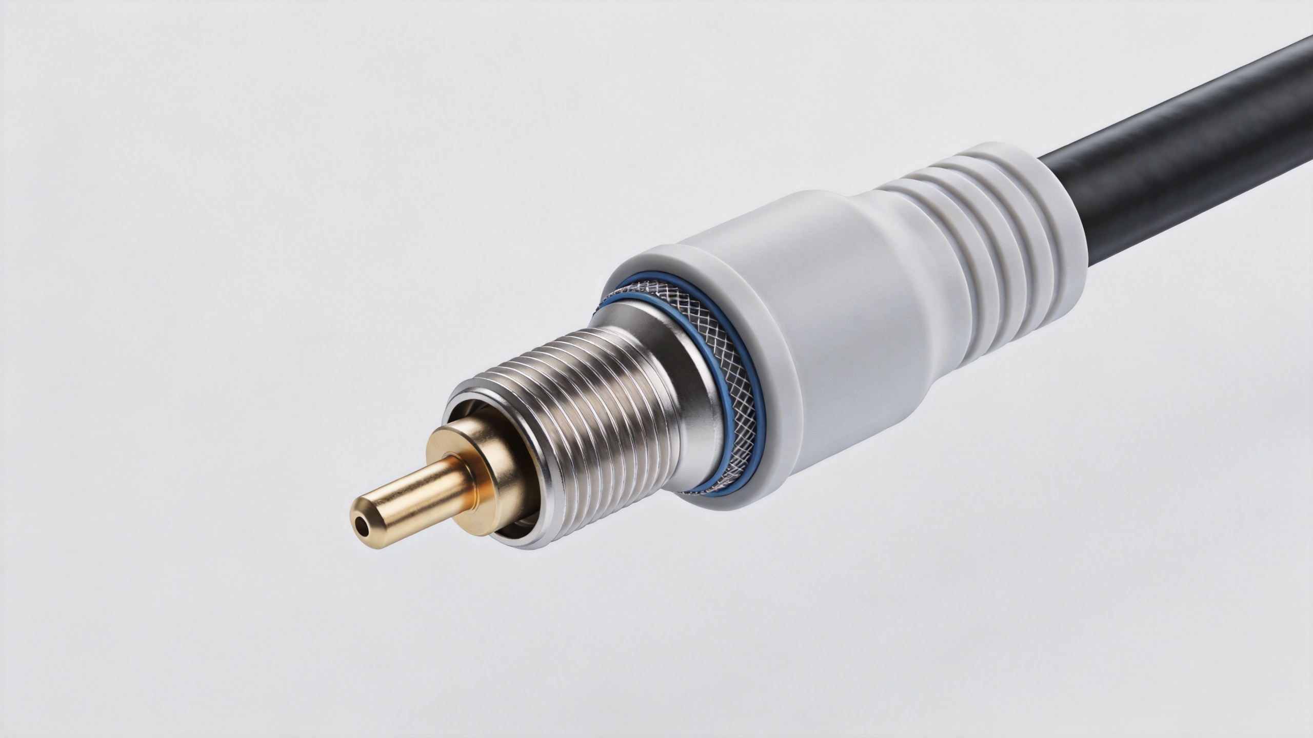 Cable overmolding strain relief on an RF cable assembly