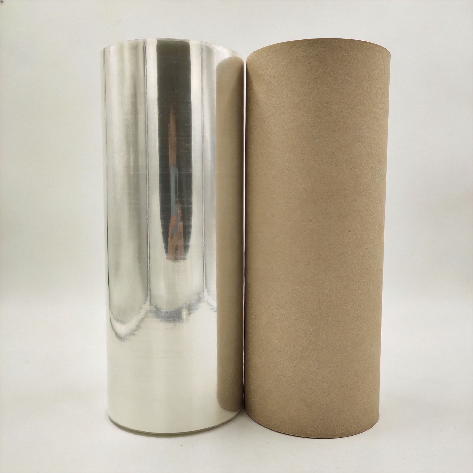Gloss and matte lamination film rolls showing surface finish comparison