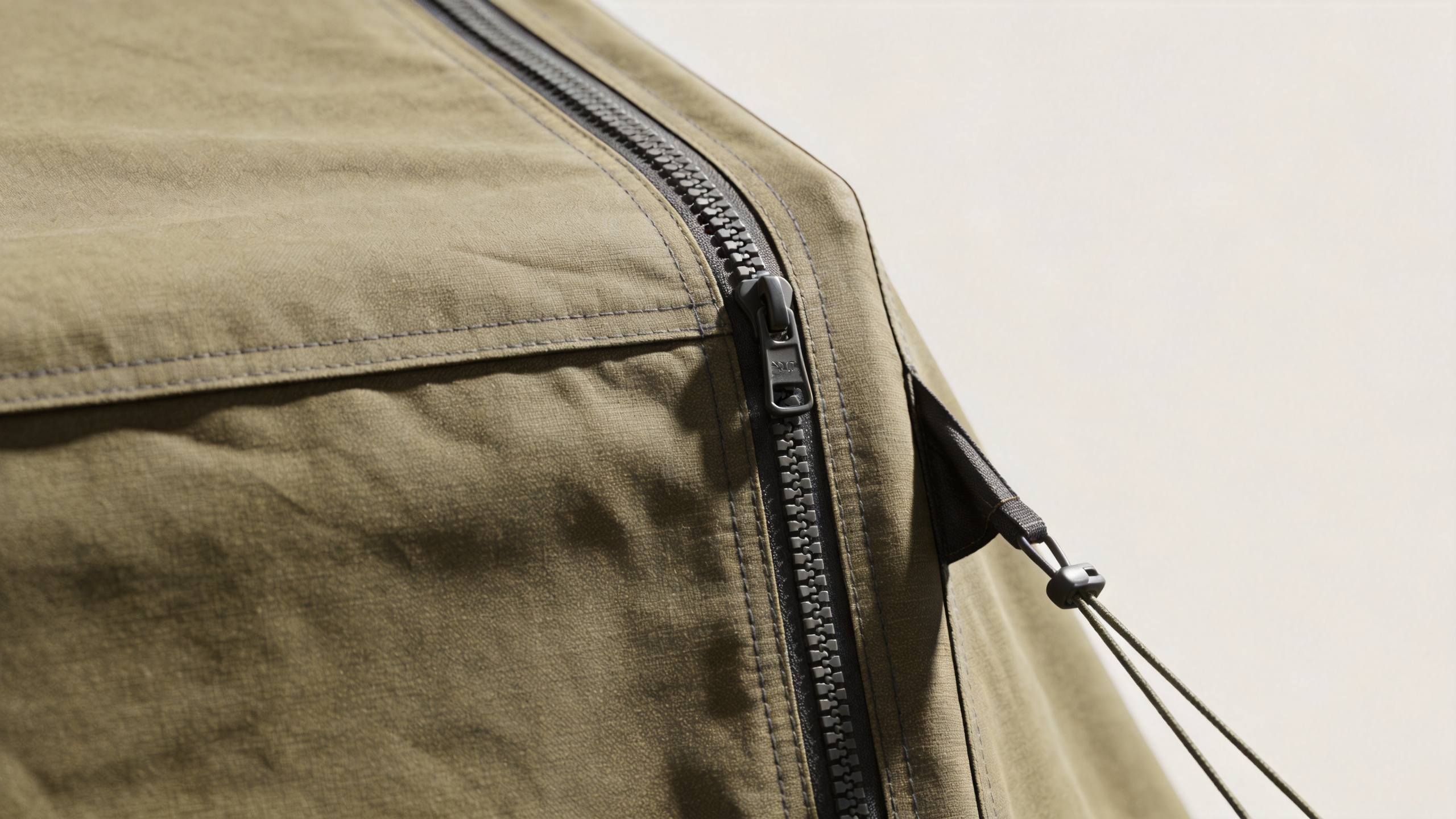 Overlander tent canvas fabric texture and weatherproof zipper seam detail