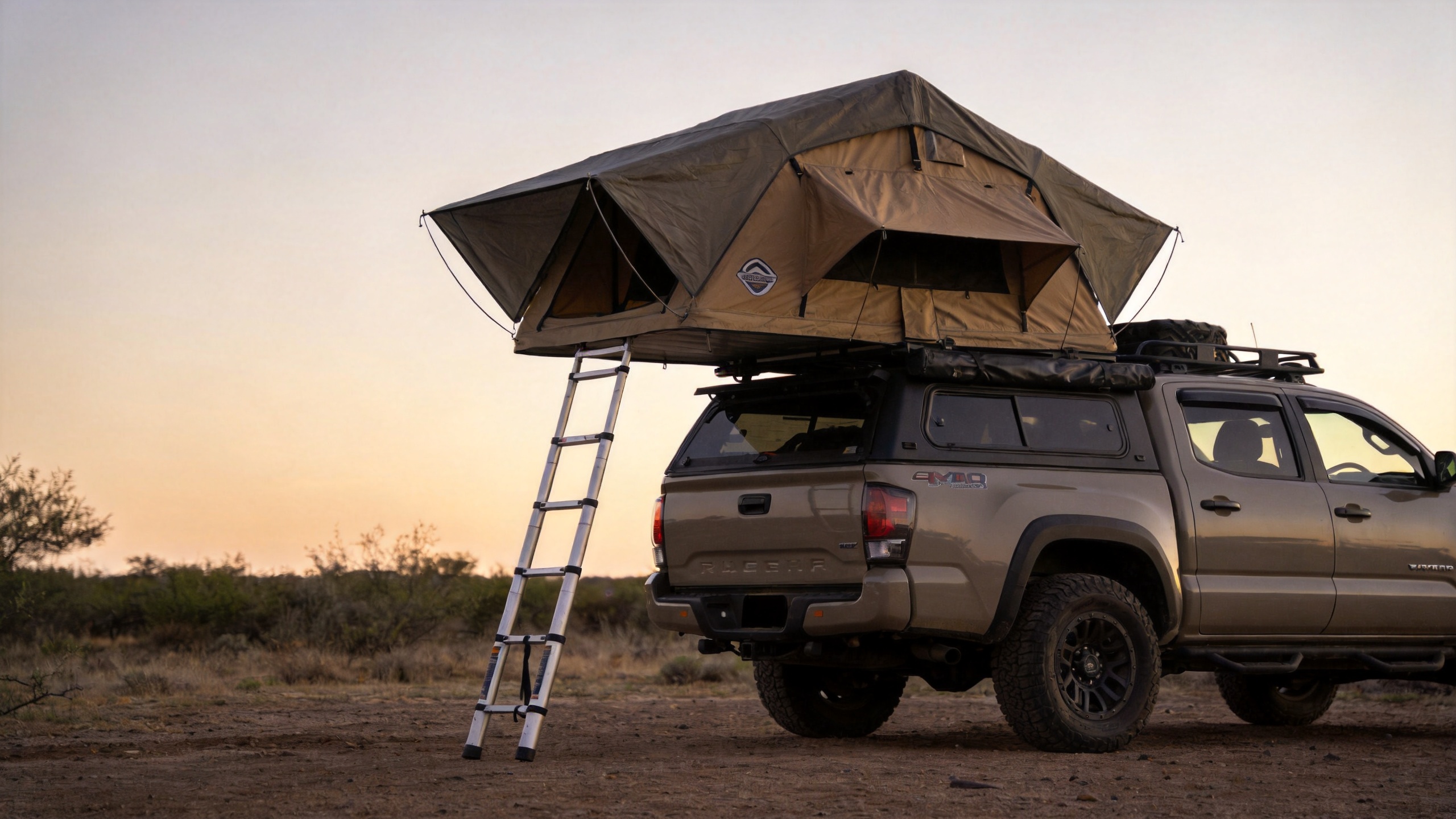 ADA tent mounted on an overlanding vehicle at camp