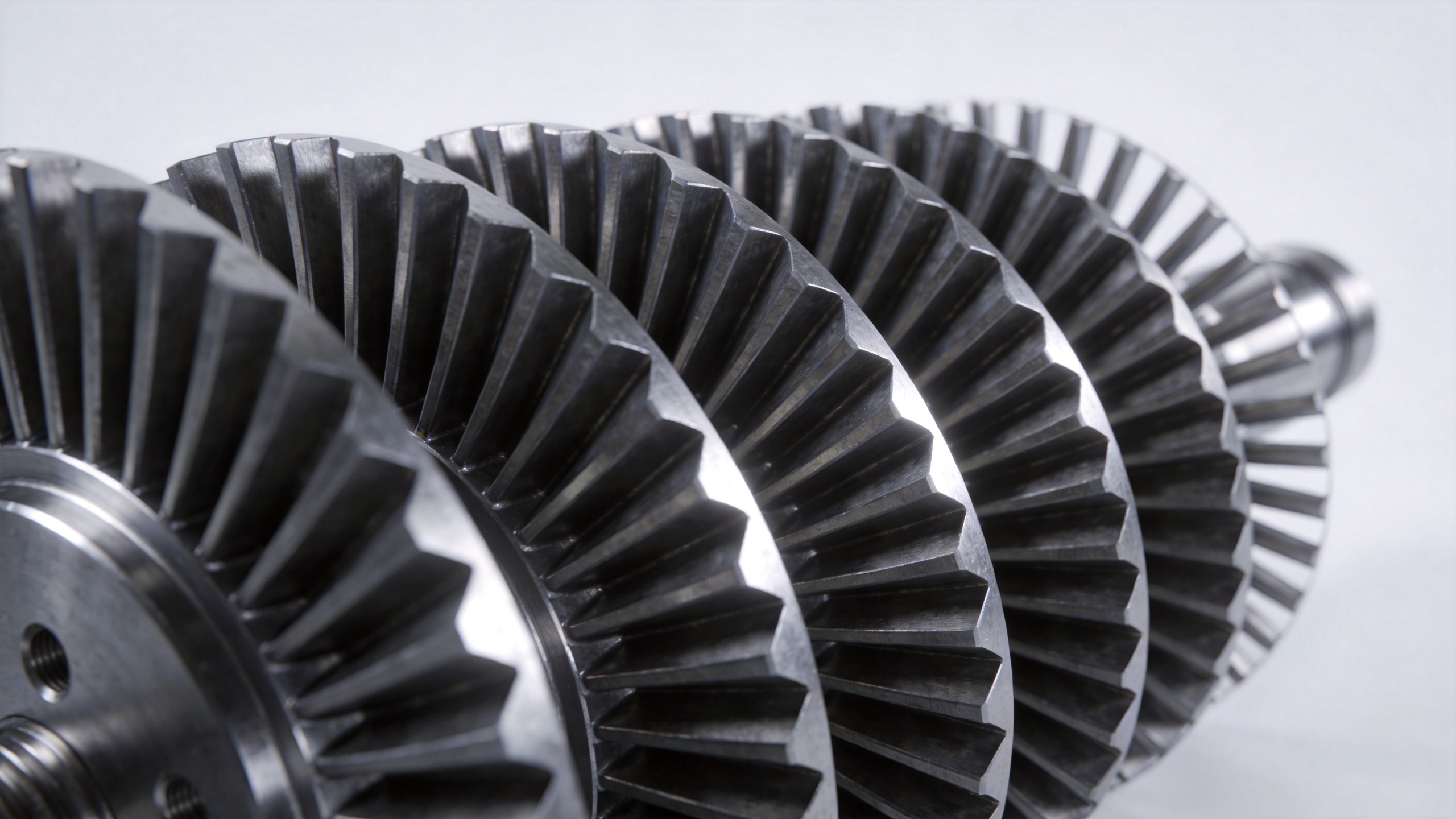 Precision forged turbine compressor blades showing airfoil profiles for equipment overhaul supply