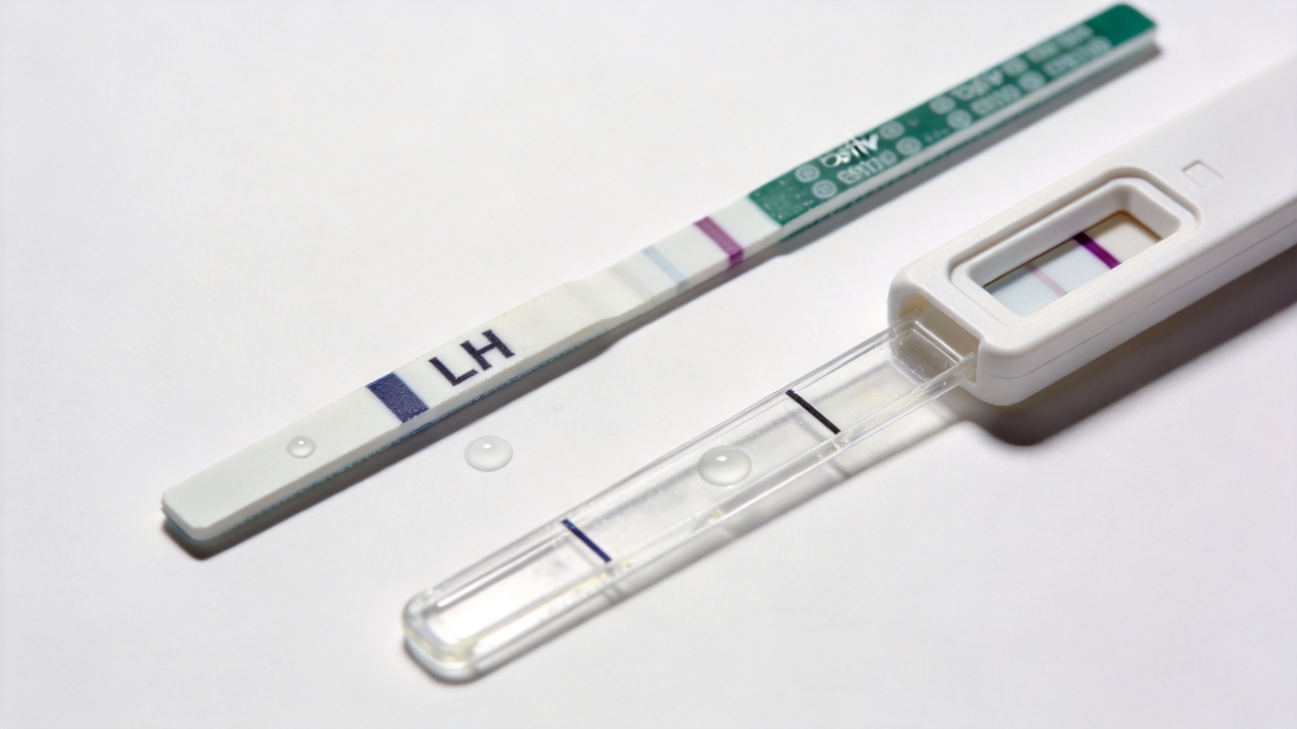 Ovulation predictor kit test result comparison showing positive and negative readings