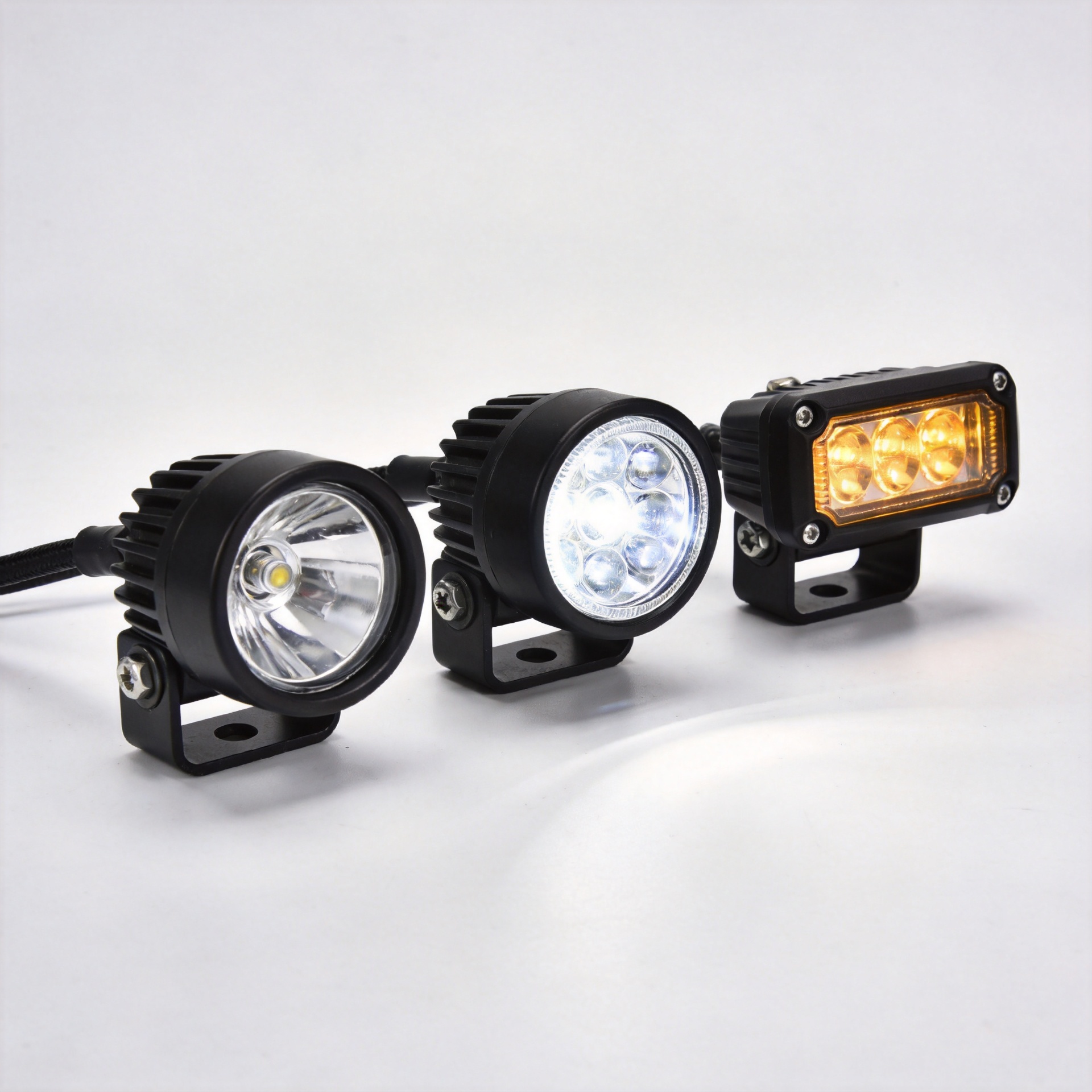Three types of motorcycle aux lights: spotlight, fog light, and DRL comparison