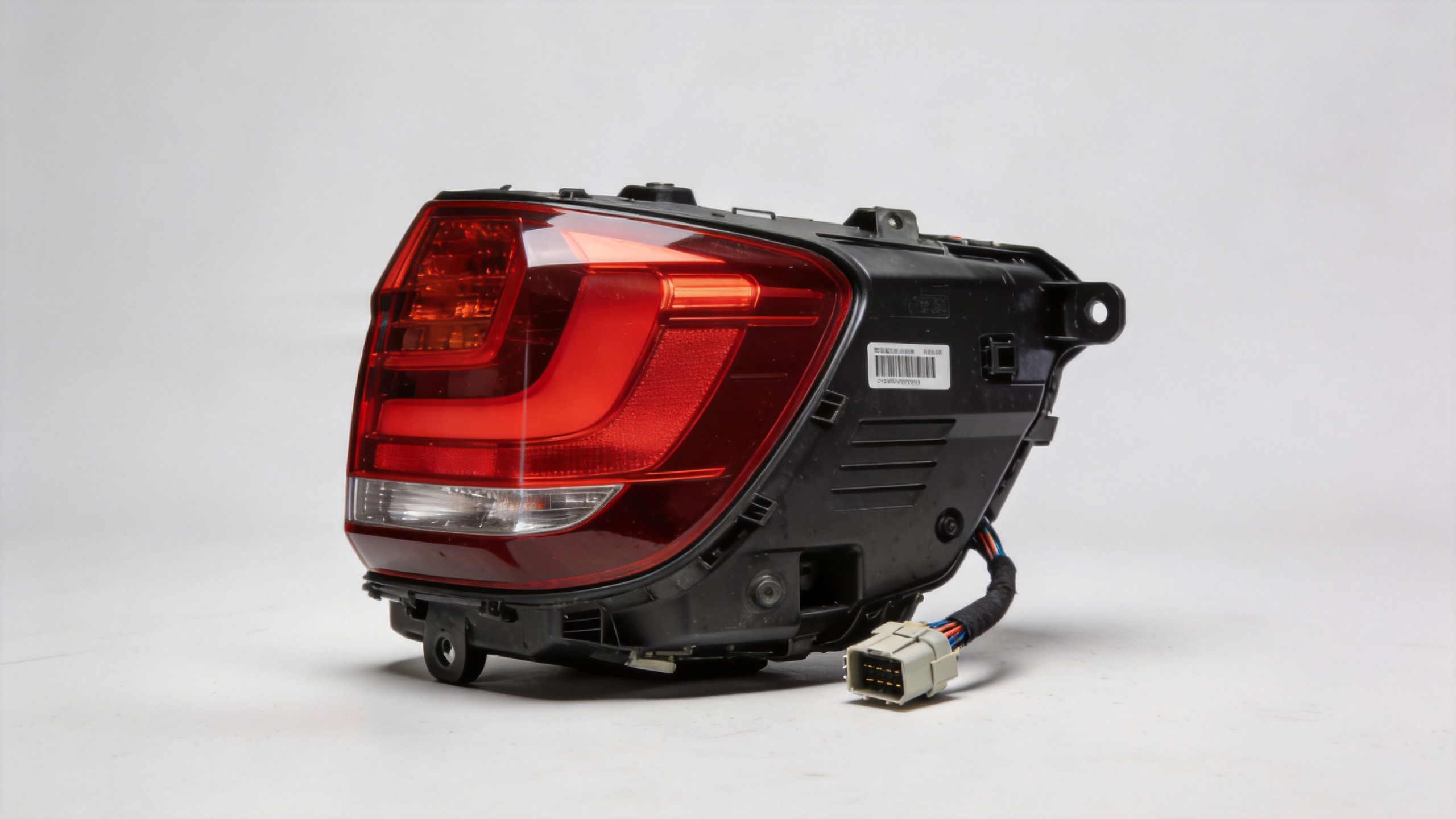 BMW tail light assembly with rear connector for fitment verification