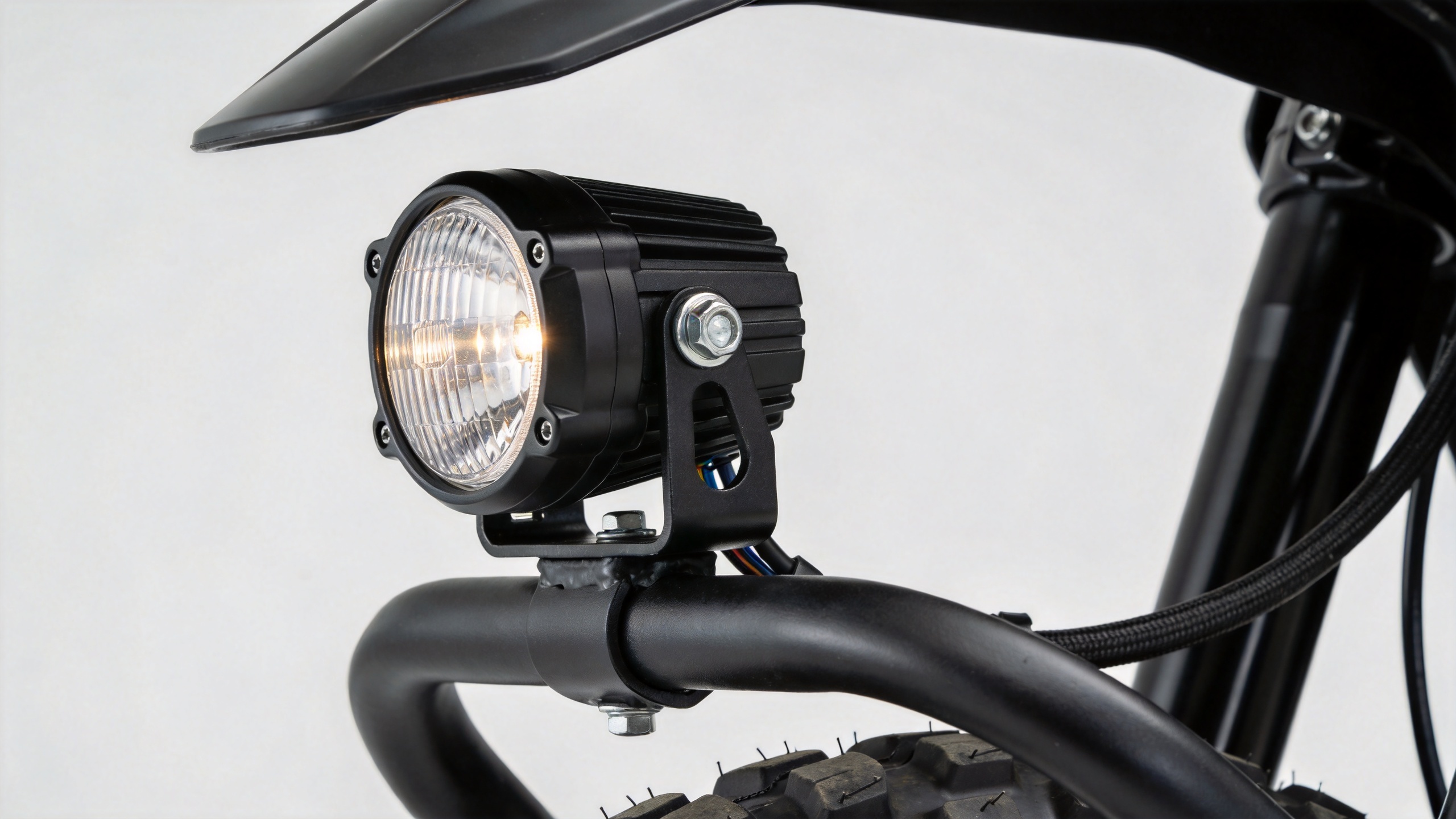Fog light clamp for bike mounted on a motorcycle crash bar